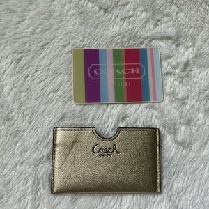 Gold metallic Coach mirror for touch ups on the go